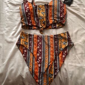 High waisted, cheeky bikini. NWT.